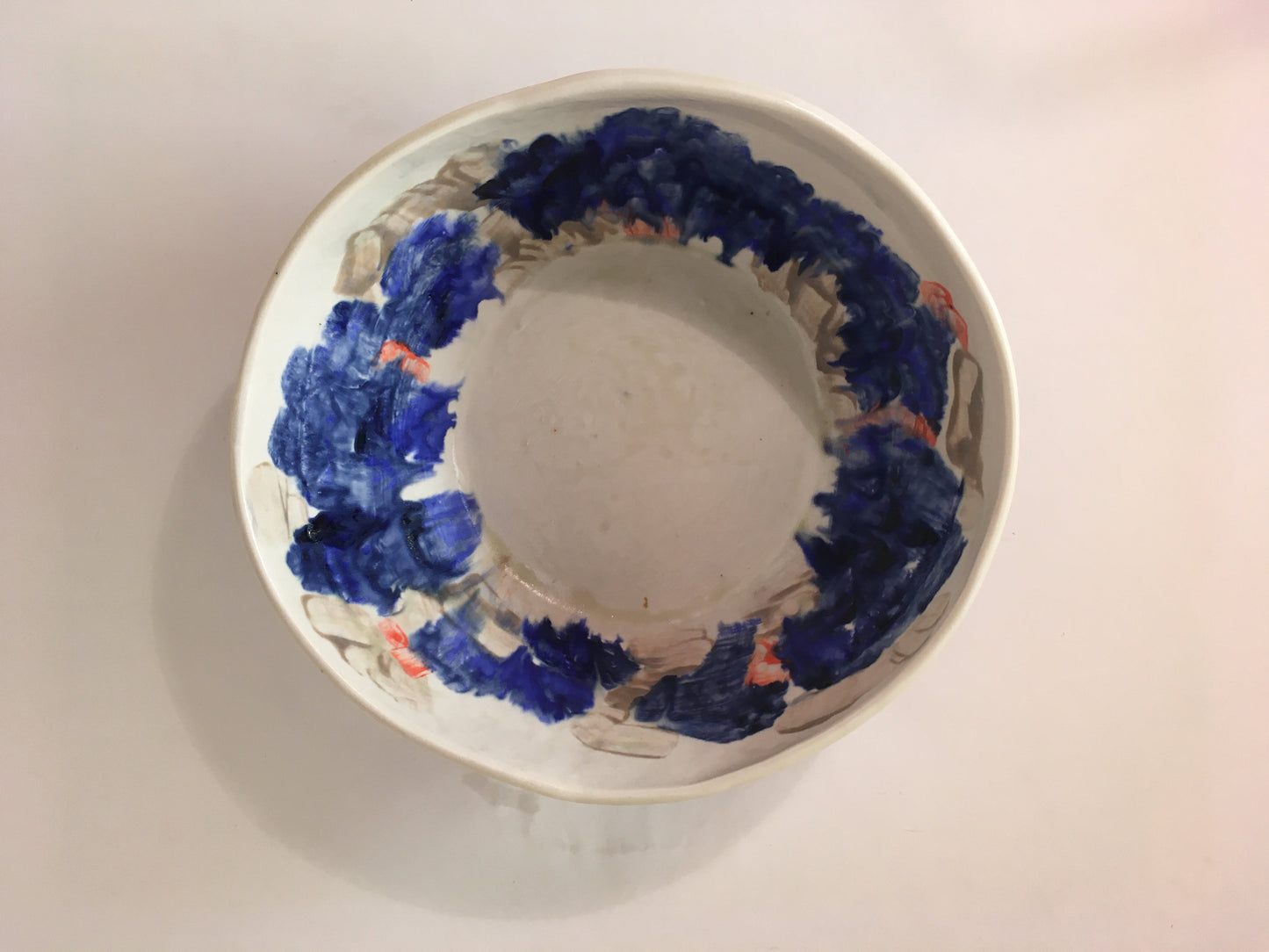 Porcelain Bowl with Grey, Blue, and Orange Marks