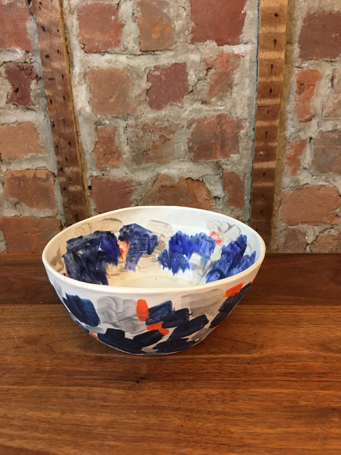 Porcelain Bowl with Grey, Blue, and Orange Marks