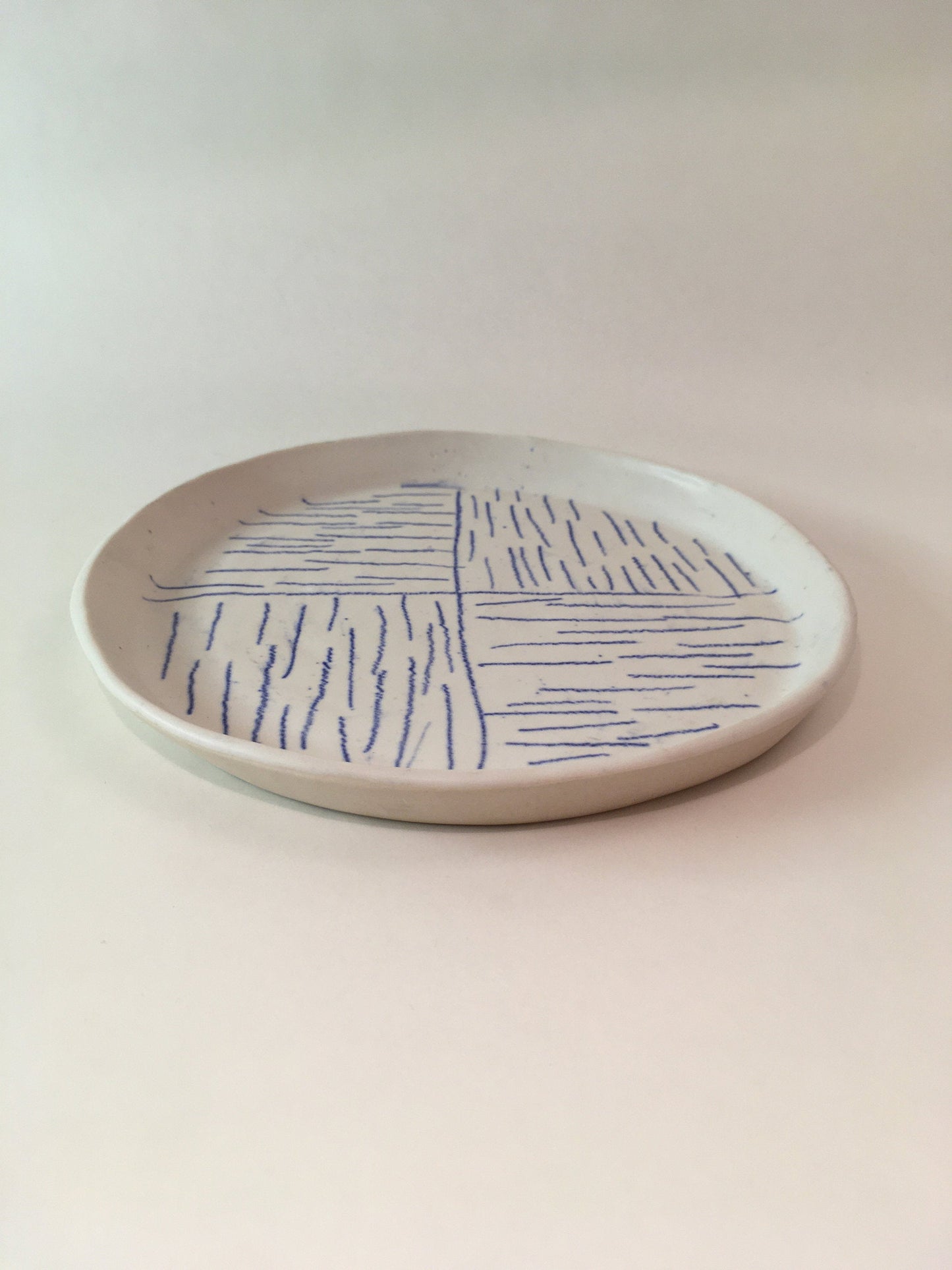 Porcelain Plate with Blue Lines in Quarters III