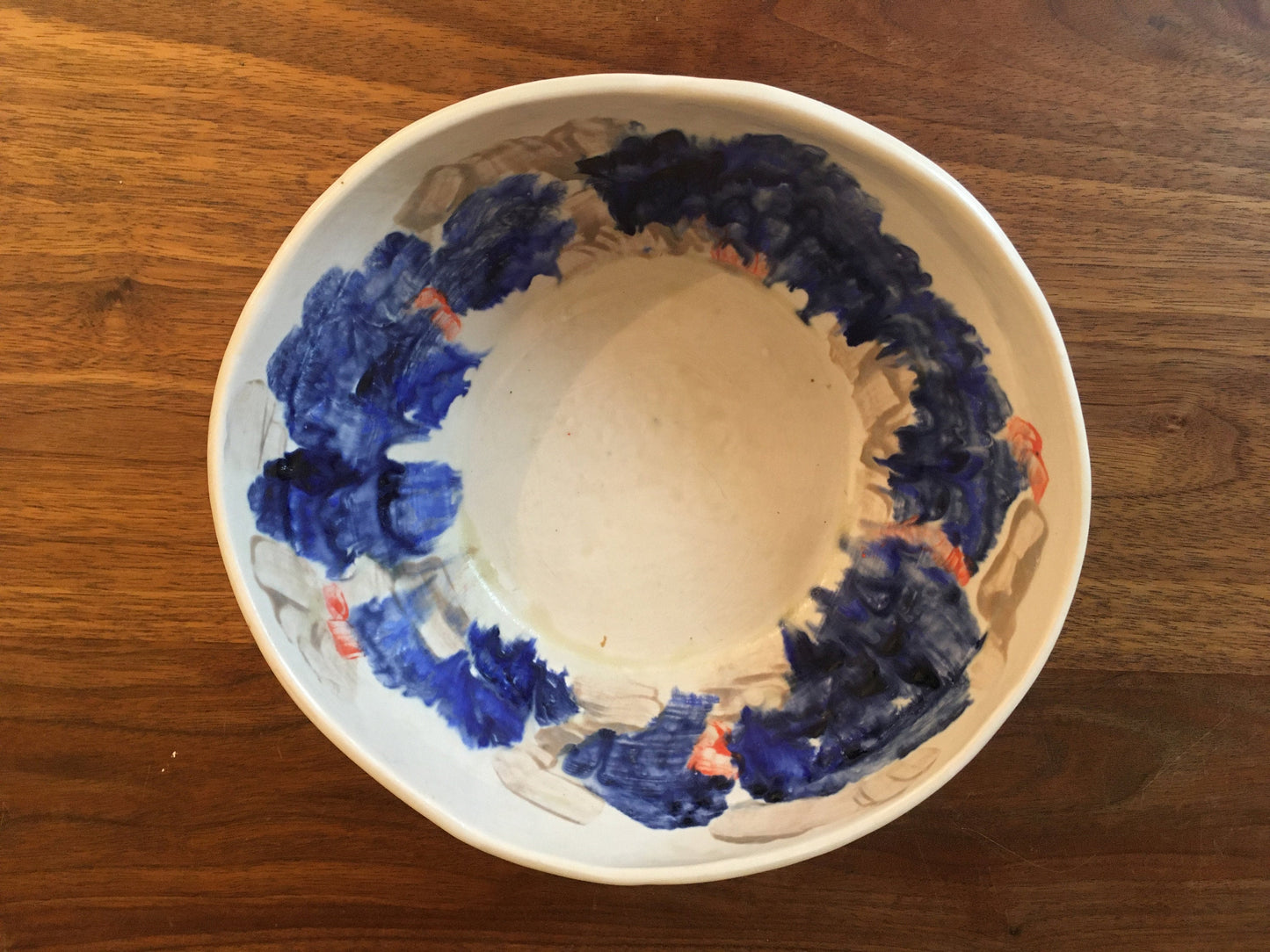 Porcelain Bowl with Grey, Blue, and Orange Marks