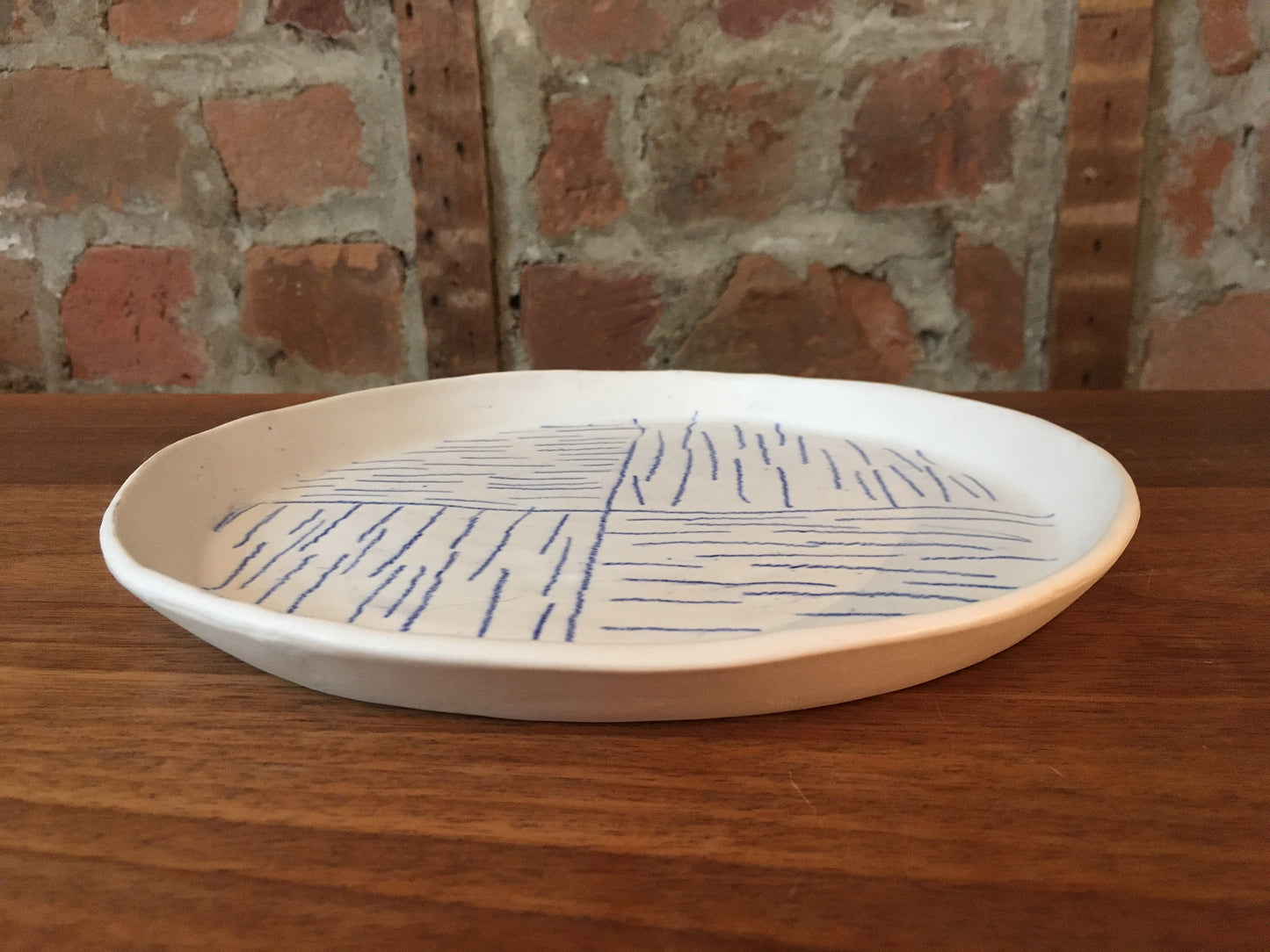 Porcelain Plate with Blue Lines in Quarters III