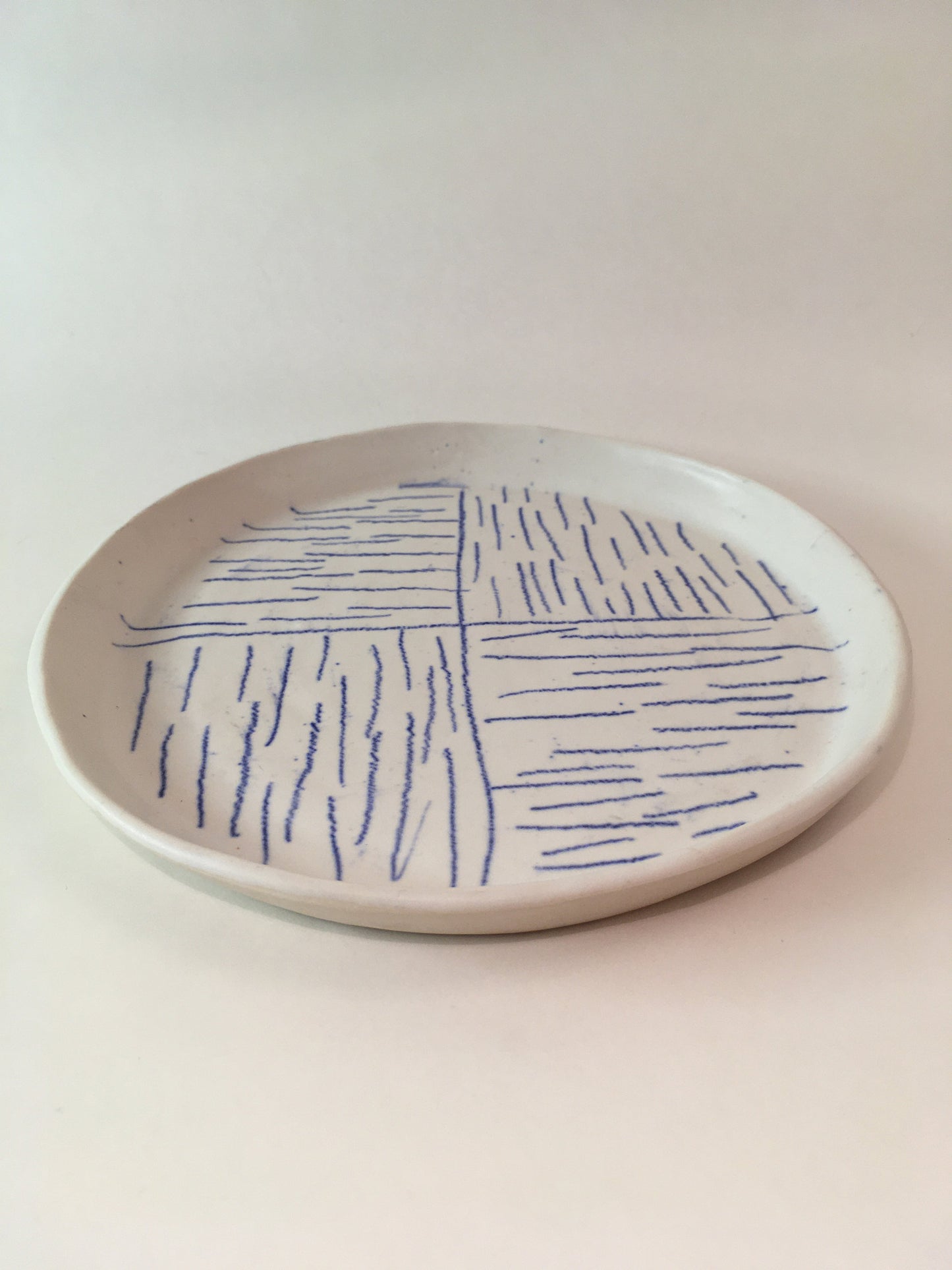 Porcelain Plate with Blue Lines in Quarters III