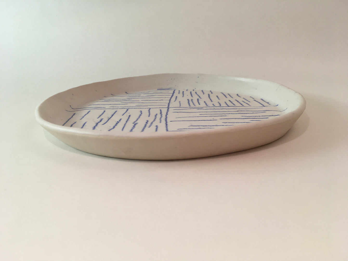 Porcelain Plate with Blue Lines in Quarters III